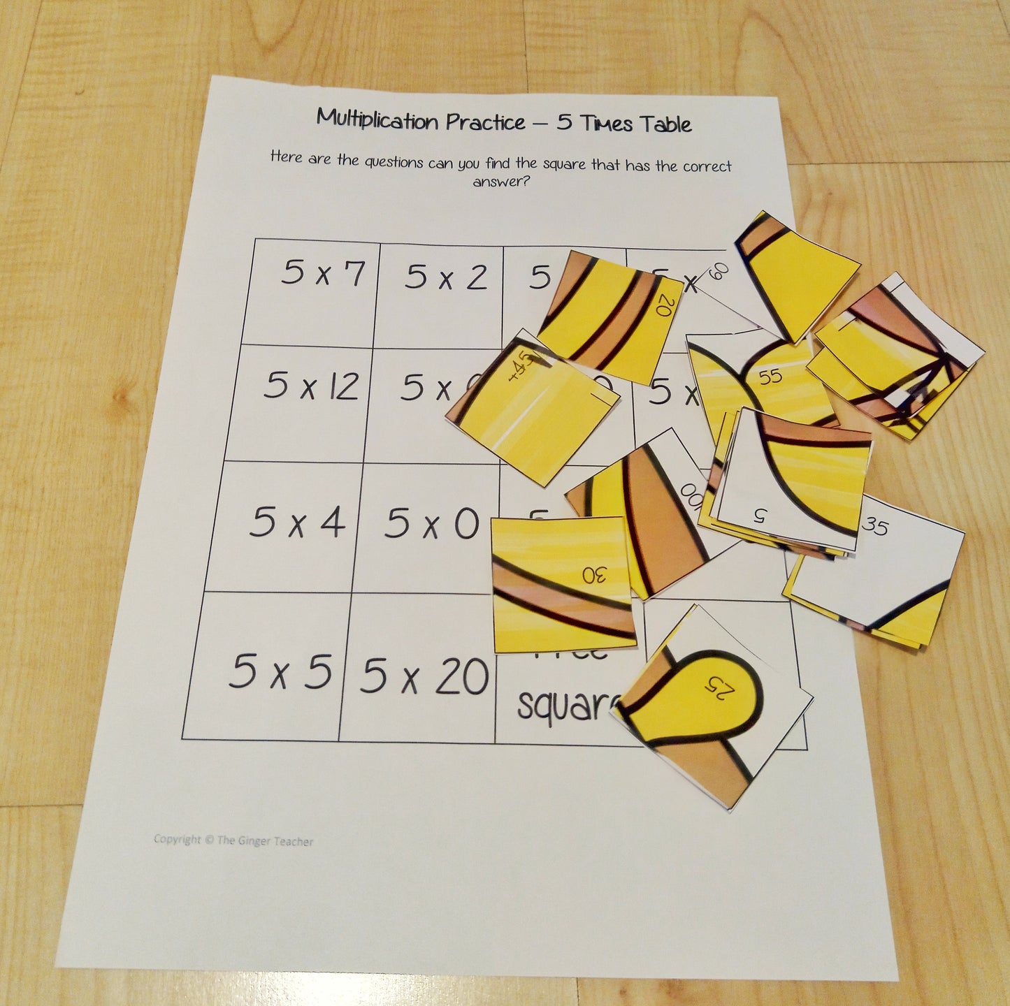 Christmas Themed Independent Multiplication Revision Sheets 5x No Prep independent revision activity for the five times tables. Children have to cut out and stick the correct answer to the question square, when the correct squares are all in place a christmas themed picture will be revealed. #teachmultiplication #revisemultiplication #fivetimestables #noprep #mathsworksheets