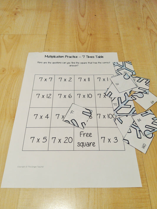 Christmas Themed Independent Multiplication Revision Sheets 7x No Prep independent revision activity for the seven times tables. Children have to cut out and stick the correct answer to the question square, when the correct squares are all in place a christmas themed picture will be revealed. #teachmultiplication #revisemultiplication #seventimestables #noprep #mathsworksheets