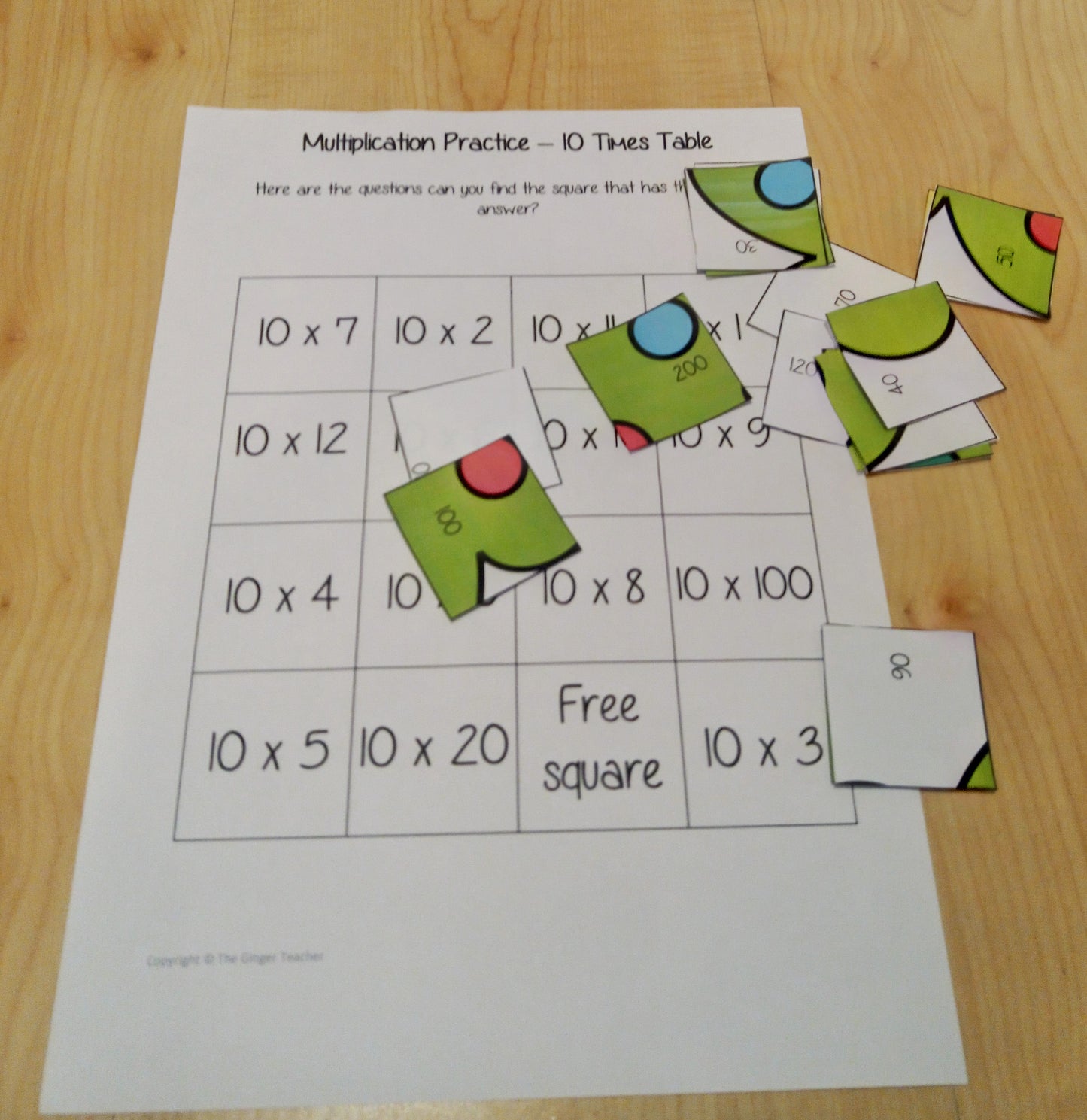 Christmas Themed Independent Multiplication Revision Sheets 10x No Prep independent revision activity for the ten times tables. Children have to cut out and stick the correct answer to the question square, when the correct squares are all in place a christmas themed picture will be revealed. #teachmultiplication #revisemultiplication #tentimestables #noprep #mathsworksheets